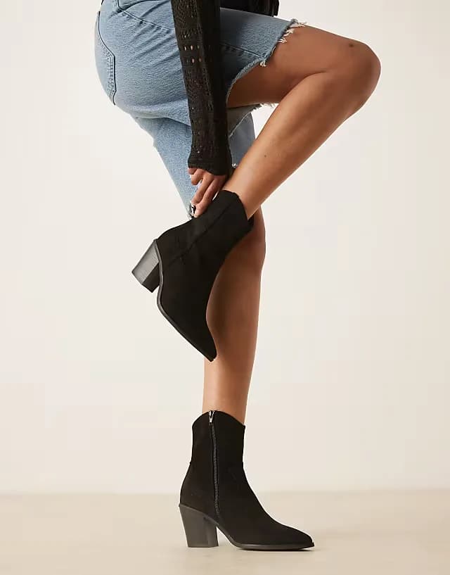 Rational heeled western boots in black