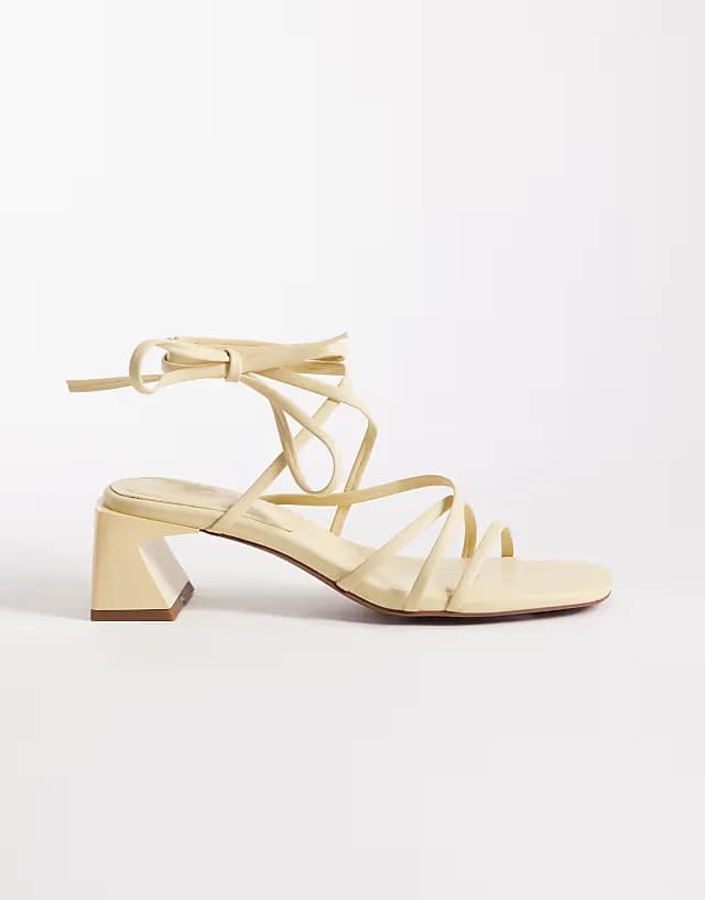 Hundred strappy block heel sandals in butter yellow