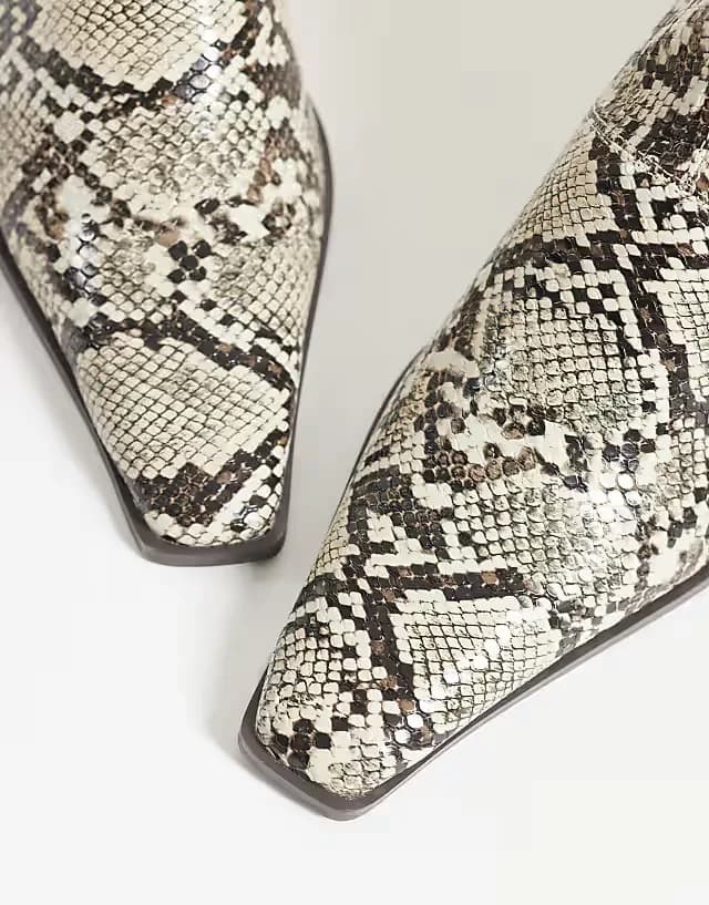 Rudy chisel toe heeled sock boots in snake print