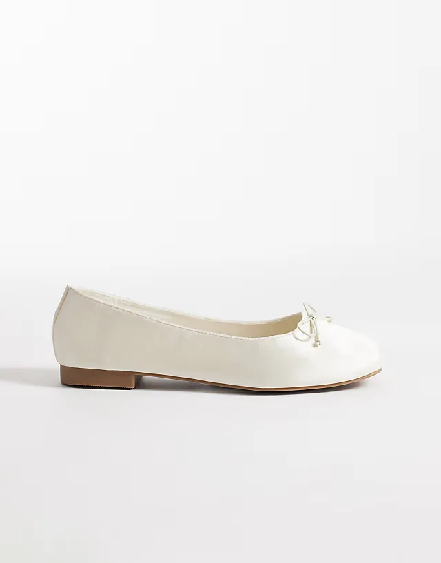 Lion bow ballet flats in ivory satin