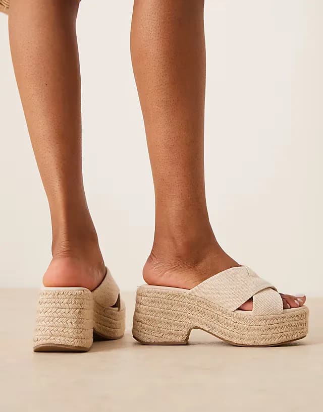 Toy cross strap wedges in natural fabrication