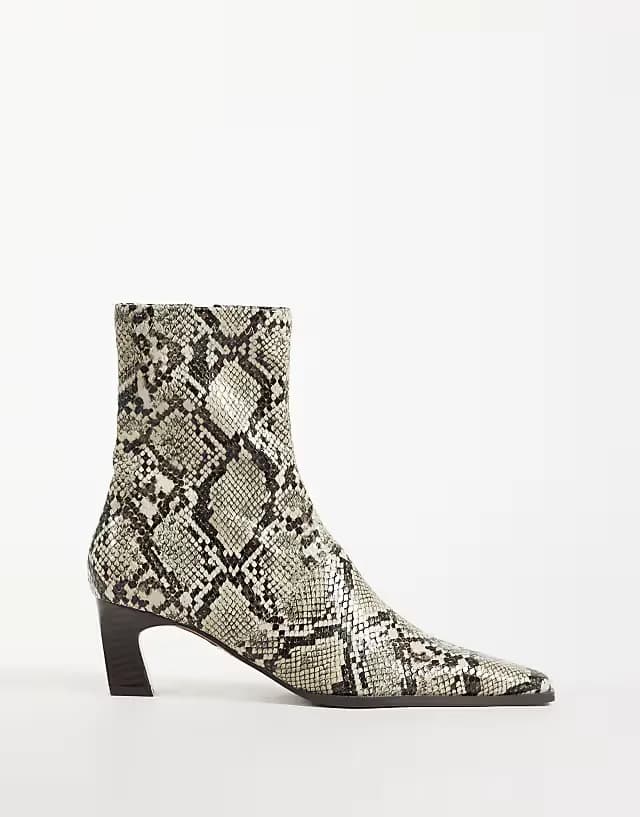 Rudy chisel toe heeled sock boots in snake print