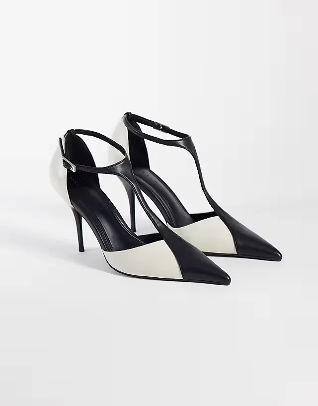 Prize T bar stiletto high pumps in black and white