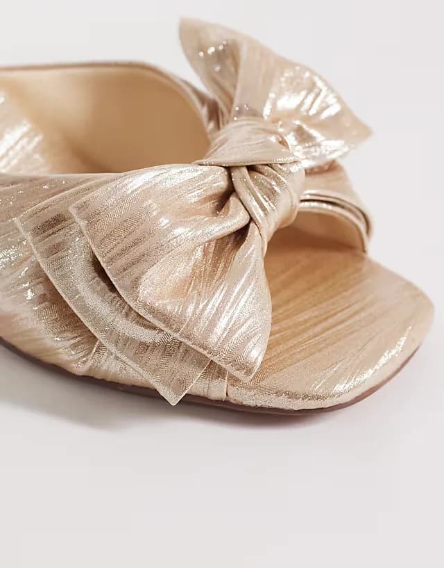 Happiness bow detail block heeled sandals in pale gold plisse
