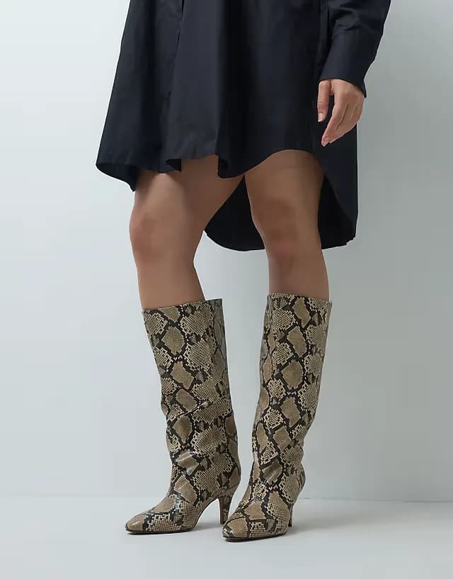 Curve Contessa cone heel slouch knee boots in snake print
