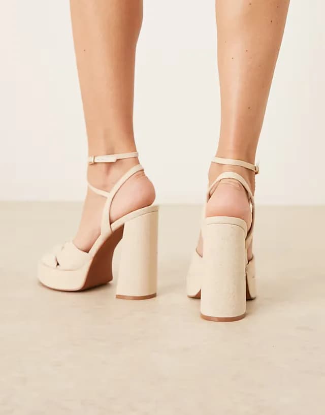 Nutcracker knot detail platform block heel sandals in natural linen