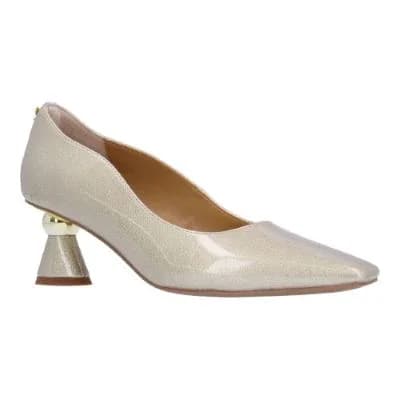 LYSANDRA-TAUPE PATENT | J Renee